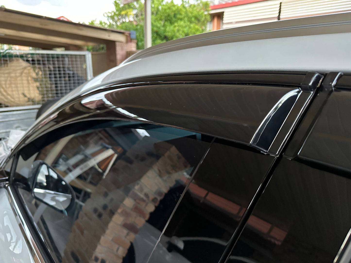 BYD ATTO3 PREMIUM TINTED WEATHERSHIELD (With Black Trim)