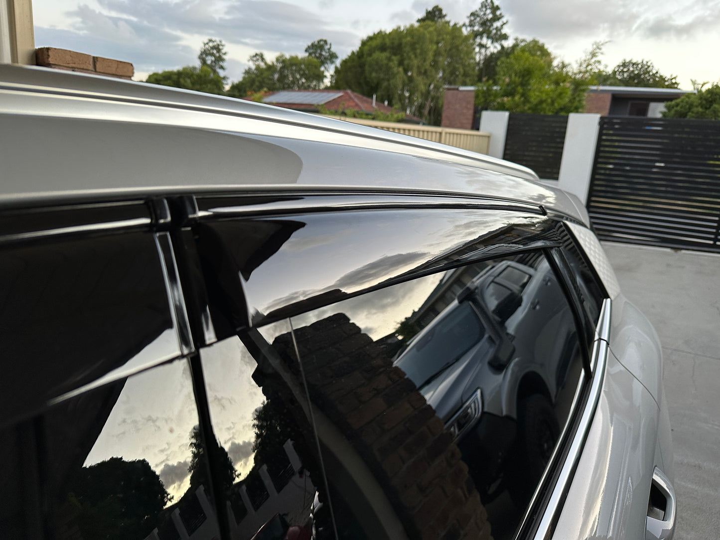 BYD ATTO3 PREMIUM TINTED WEATHERSHIELD (With Black Trim)