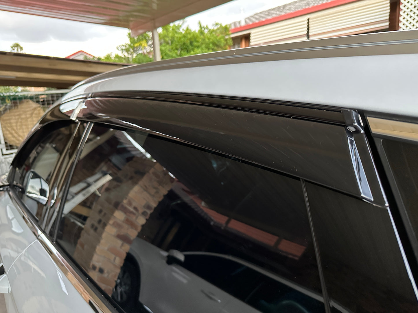 BYD ATTO3 PREMIUM TINTED WEATHERSHIELD (With Black Trim)